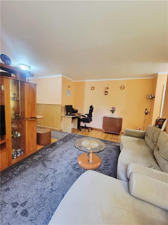 388 Avenue S Unit 2C, Brooklyn, NY 11223 - living room featuring a desk, wood finished floors, and ornamental molding