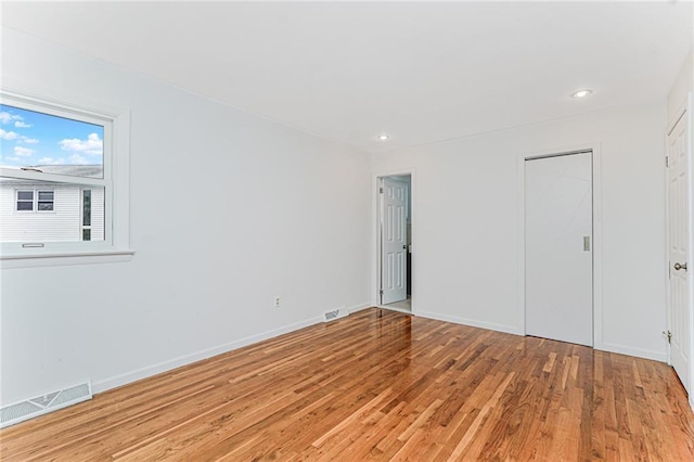 161 Ravenhurst Ave, Staten Island, NY 10310 - unfurnished bedroom with light wood-type flooring and recessed lighting