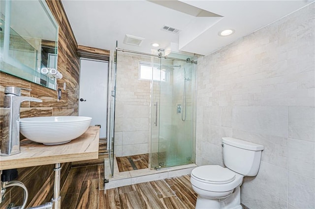 161 Ravenhurst Ave, Staten Island, NY 10310 - full bath featuring a shower stall, vanity, wood finished floors, and tile walls