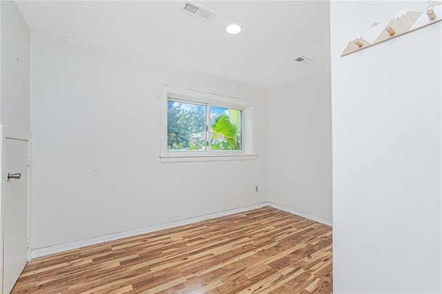 161 Ravenhurst Ave, Staten Island, NY 10310 - empty room with light wood-style floors and recessed lighting