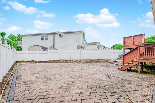 161 Ravenhurst Ave, Staten Island, NY 10310 - fenced backyard with a patio area, stairway, and a wooden deck