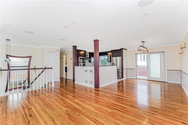 161 Ravenhurst Ave, Staten Island, NY 10310 - unfurnished living room with crown molding and light wood-style flooring