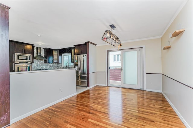161 Ravenhurst Ave, Staten Island, NY 10310 - unfurnished dining area featuring light wood-style floors and ornamental molding