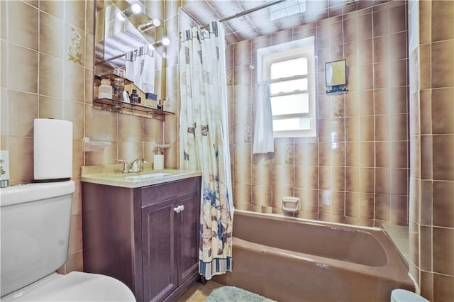 2045 W 11th St, Brooklyn, NY 11223 - bathroom with tile walls, shower / tub combo with curtain, and vanity