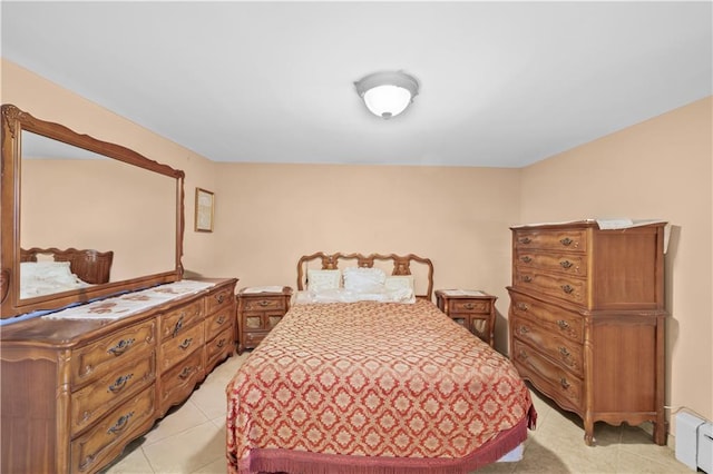 2045 W 11th St, Brooklyn, NY 11223 - bedroom with a baseboard heating unit