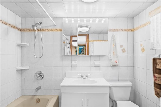2045 W 11th St, Brooklyn, NY 11223 - bathroom with vanity, tub / shower combination, and tile walls