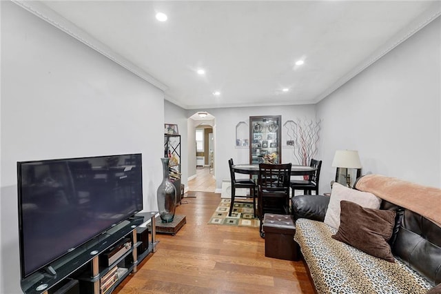 1650 E 48th St, Brooklyn, NY 11234 - living room with arched walkways, ornamental molding, recessed lighting, and wood finished floors