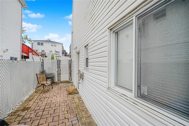443 Ridgewood Ave, Staten Island, NY 10312 - view of side of property with a fenced backyard and a patio