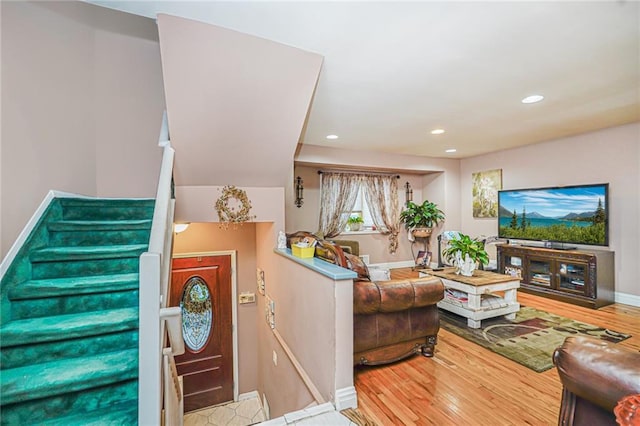 443 Ridgewood Ave, Staten Island, NY 10312 - living area with wood finished floors, recessed lighting, and stairway
