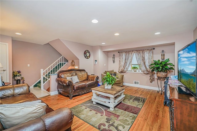 443 Ridgewood Ave, Staten Island, NY 10312 - living area featuring stairs, wood finished floors, and recessed lighting