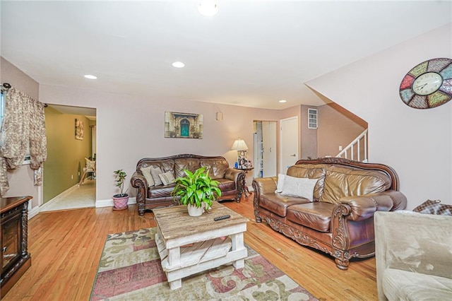 443 Ridgewood Ave, Staten Island, NY 10312 - living room with wood finished floors, recessed lighting, and stairway