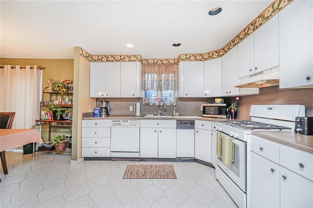 443 Ridgewood Ave, Staten Island, NY 10312 - kitchen featuring white appliances, under cabinet range hood, white cabinets, and recessed lighting
