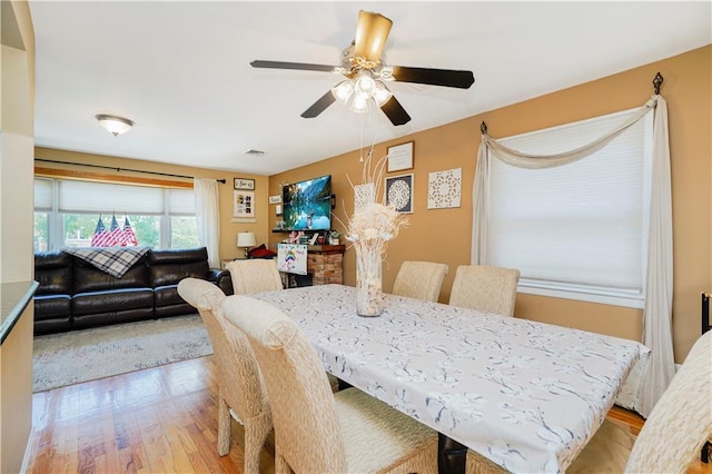 731 Stafford Ave, Staten Island, NY 10309 - dining room with light wood finished floors and a ceiling fan