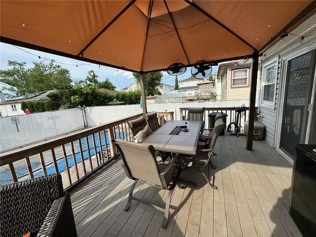 731 Stafford Ave, Staten Island, NY 10309 - wooden deck with outdoor dining space and a fenced backyard