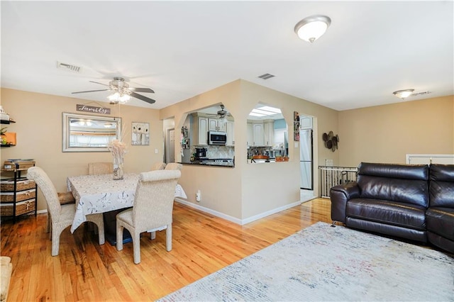 731 Stafford Ave, Staten Island, NY 10309 - dining area with a ceiling fan and light wood-style flooring