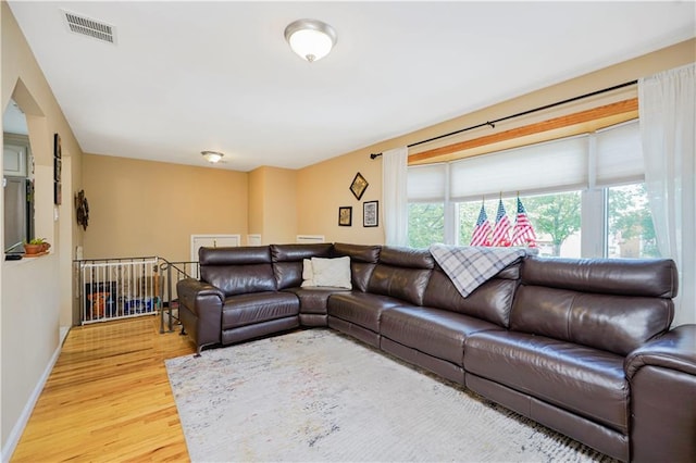 731 Stafford Ave, Staten Island, NY 10309 - living room with light wood-style floors and baseboards