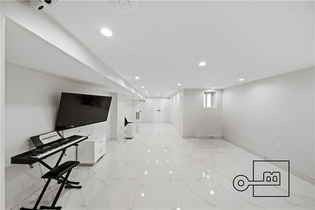 1168 E 12th St, Brooklyn, NY 11230 - unfurnished living room with recessed lighting and light marble finish floors