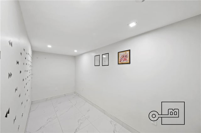 1168 E 12th St, Brooklyn, NY 11230 - empty room with light marble finish floors and recessed lighting