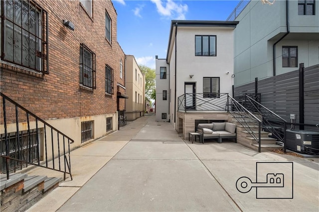 1168 E 12th St, Brooklyn, NY 11230 - view of concrete alley featuring stairs