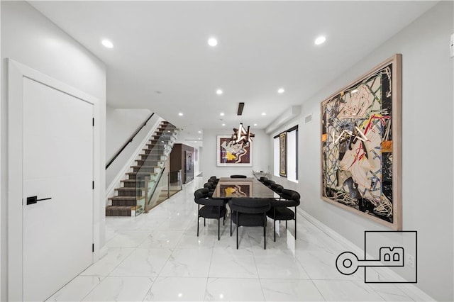 1168 E 12th St, Brooklyn, NY 11230 - dining space featuring stairway, light marble finish flooring, and recessed lighting
