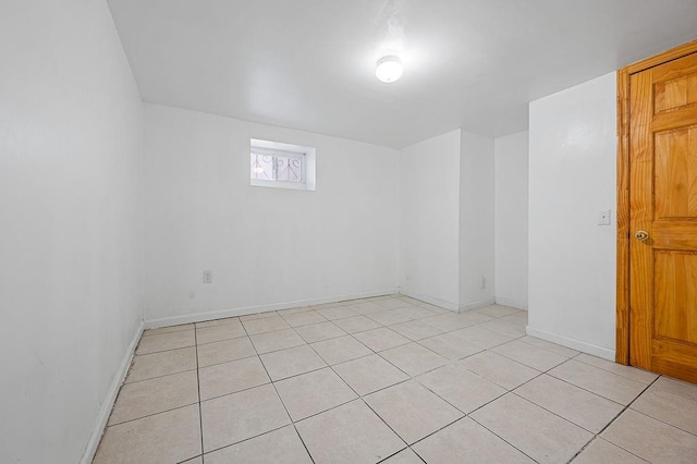 8309 19th Ave, Brooklyn, NY 11214 - unfurnished room with light tile patterned floors and baseboards