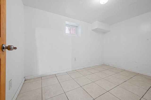 8309 19th Ave, Brooklyn, NY 11214 - unfurnished room with light tile patterned floors and baseboards