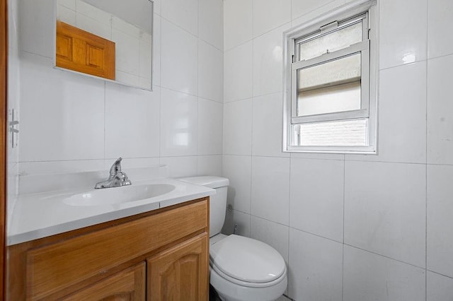 8309 19th Ave, Brooklyn, NY 11214 - half bathroom with vanity and tile walls