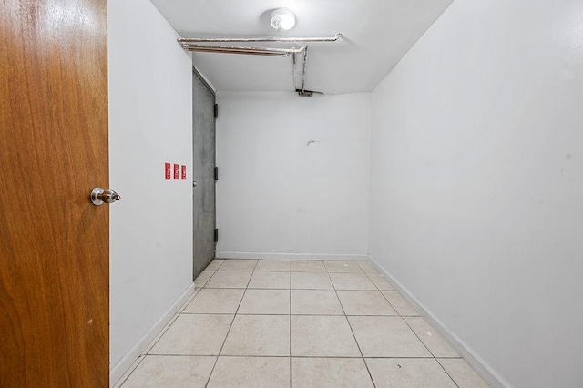 8309 19th Ave, Brooklyn, NY 11214 - empty room featuring light tile patterned floors