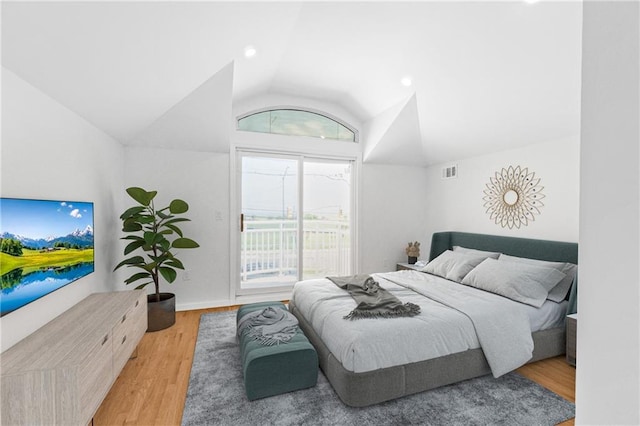 795 Father Capodanno Blvd, Staten Island, NY 10305 - bedroom with access to exterior, lofted ceiling, and wood finished floors