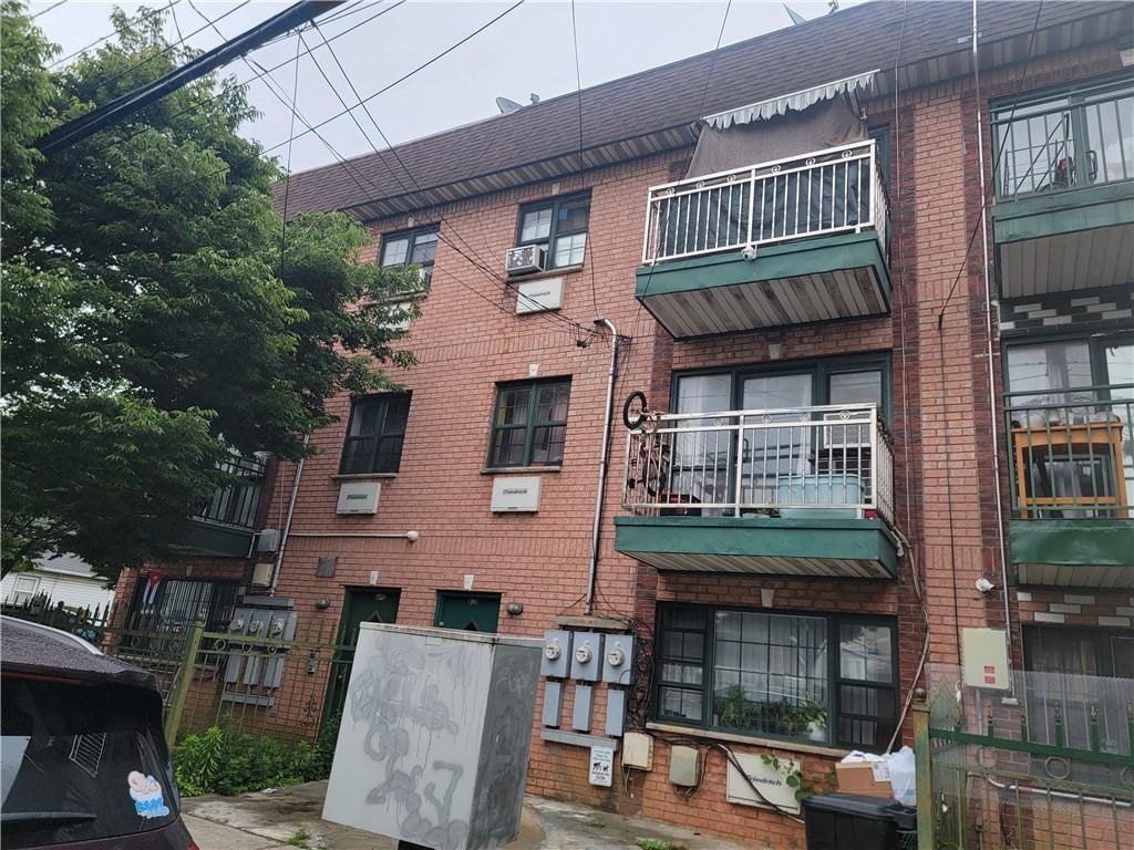 638 Grassmere Ter, Far Rockaway, NY 11691 - view of property with cooling unit