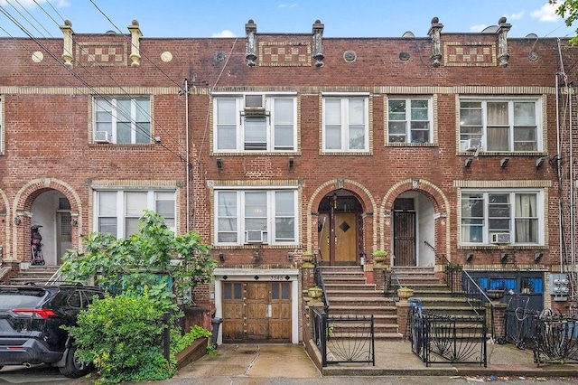 3545 12th Ave, Brooklyn, NY 11218 - townhome / multi-family property with brick siding and an attached garage