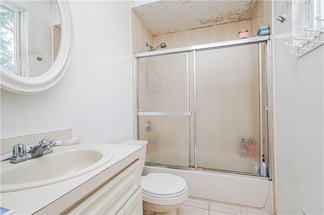 134 S Ave, Staten Island, NY 10303 - bathroom featuring vanity, bath / shower combo with glass door, and tile patterned flooring