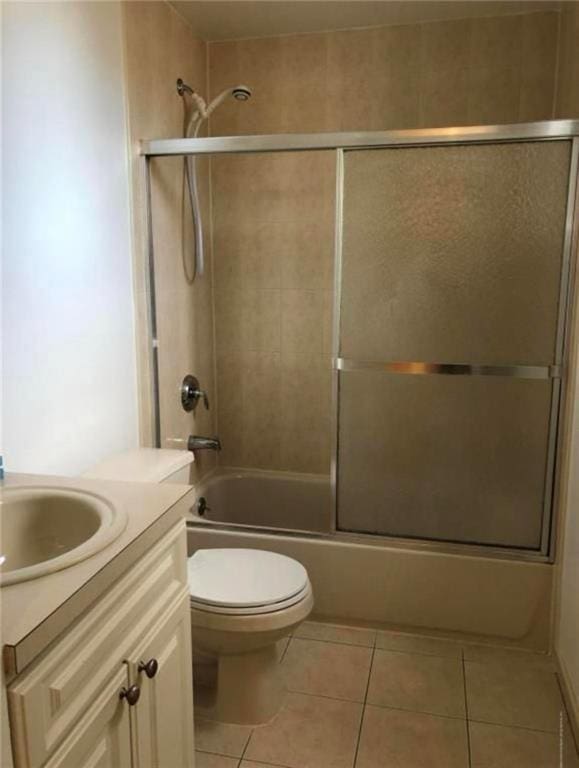 134 S Ave, Staten Island, NY 10303 - bathroom with tile patterned floors, vanity, and shower / bath combination with glass door