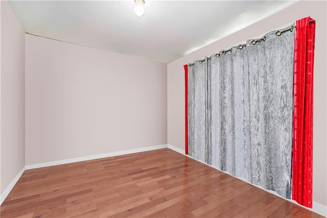 134 S Ave, Staten Island, NY 10303 - spare room with wood finished floors and baseboards