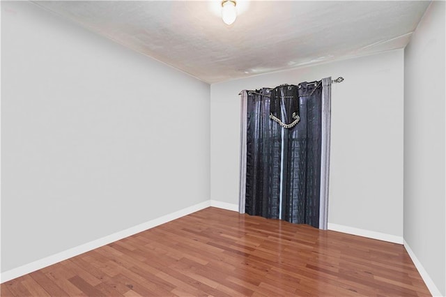 134 S Ave, Staten Island, NY 10303 - spare room with wood finished floors and baseboards