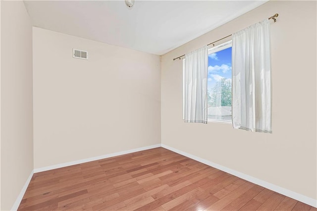 134 S Ave, Staten Island, NY 10303 - spare room with light wood-type flooring and baseboards