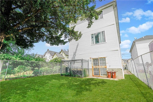 134 S Ave, Staten Island, NY 10303 - rear view of house with a fenced backyard