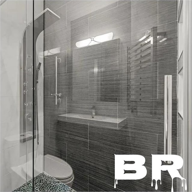 2507 E 23rd St, Brooklyn, NY 11235 - bathroom with toilet and a stall shower