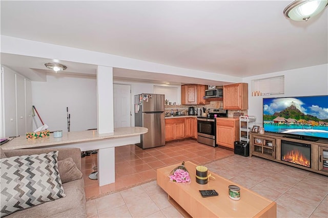 2267 W 6th St, Brooklyn, NY 11223 - living area featuring light tile patterned flooring