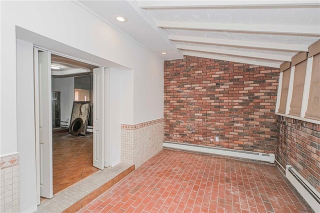 2267 W 6th St, Brooklyn, NY 11223 - empty room with a baseboard heating unit and a wainscoted wall
