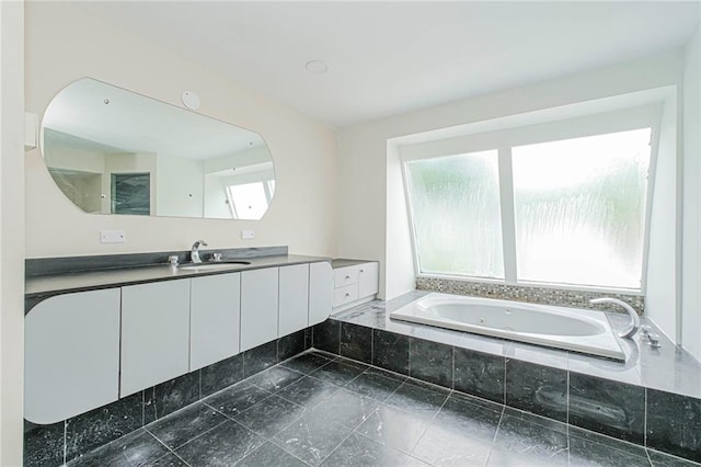 2267 W 6th St, Brooklyn, NY 11223 - bathroom featuring a whirlpool tub and vanity