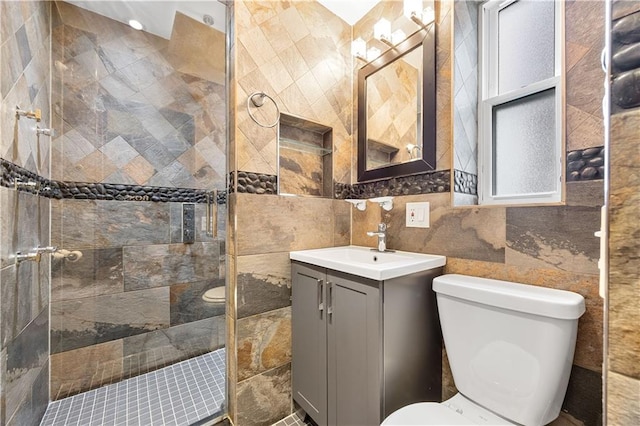 9430 Ridge Blvd Unit 4E, Brooklyn, NY 11209 - bathroom with a shower stall, tile walls, and vanity