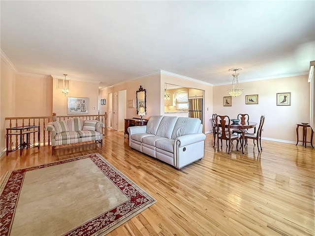 143 Getz Ave, Staten Island, NY 10312 - living room with a chandelier, light wood-style flooring, and crown molding