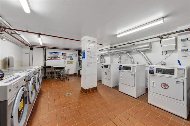 1240 Bedford Ave Unit 1H, Brooklyn, NY 11216 - communal laundry room featuring washing machine and clothes dryer and light tile patterned floors
