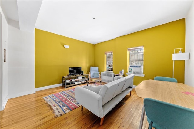 1240 Bedford Ave Unit 1H, Brooklyn, NY 11216 - living area featuring wood finished floors and baseboards