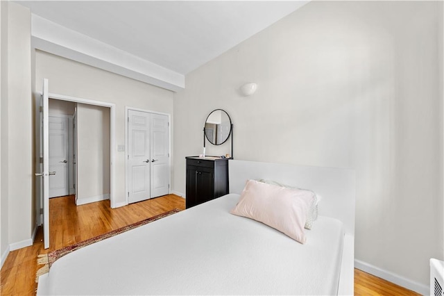 1240 Bedford Ave Unit 1H, Brooklyn, NY 11216 - bedroom featuring light wood-style flooring and a closet