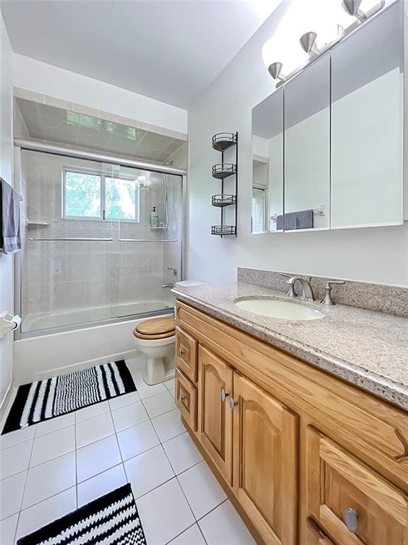 5 Greaves Ave, Staten Island, NY 10308 - full bathroom with vanity, tile patterned flooring, and enclosed tub / shower combo