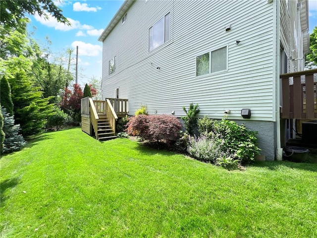5 Greaves Ave, Staten Island, NY 10308 - view of property exterior featuring a lawn, a deck, and stairway