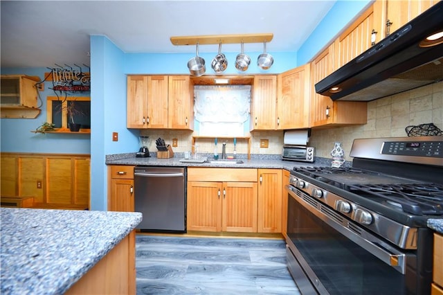 15 Allison Pl, Staten Island, NY 10306 - kitchen featuring stainless steel appliances, extractor fan, light wood-style flooring, backsplash, and light stone counters