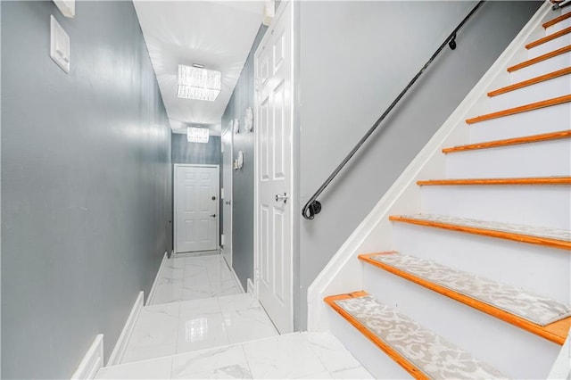 172 Rosedale Ave, Staten Island, NY 10312 - stairs with marble look tiles and baseboards